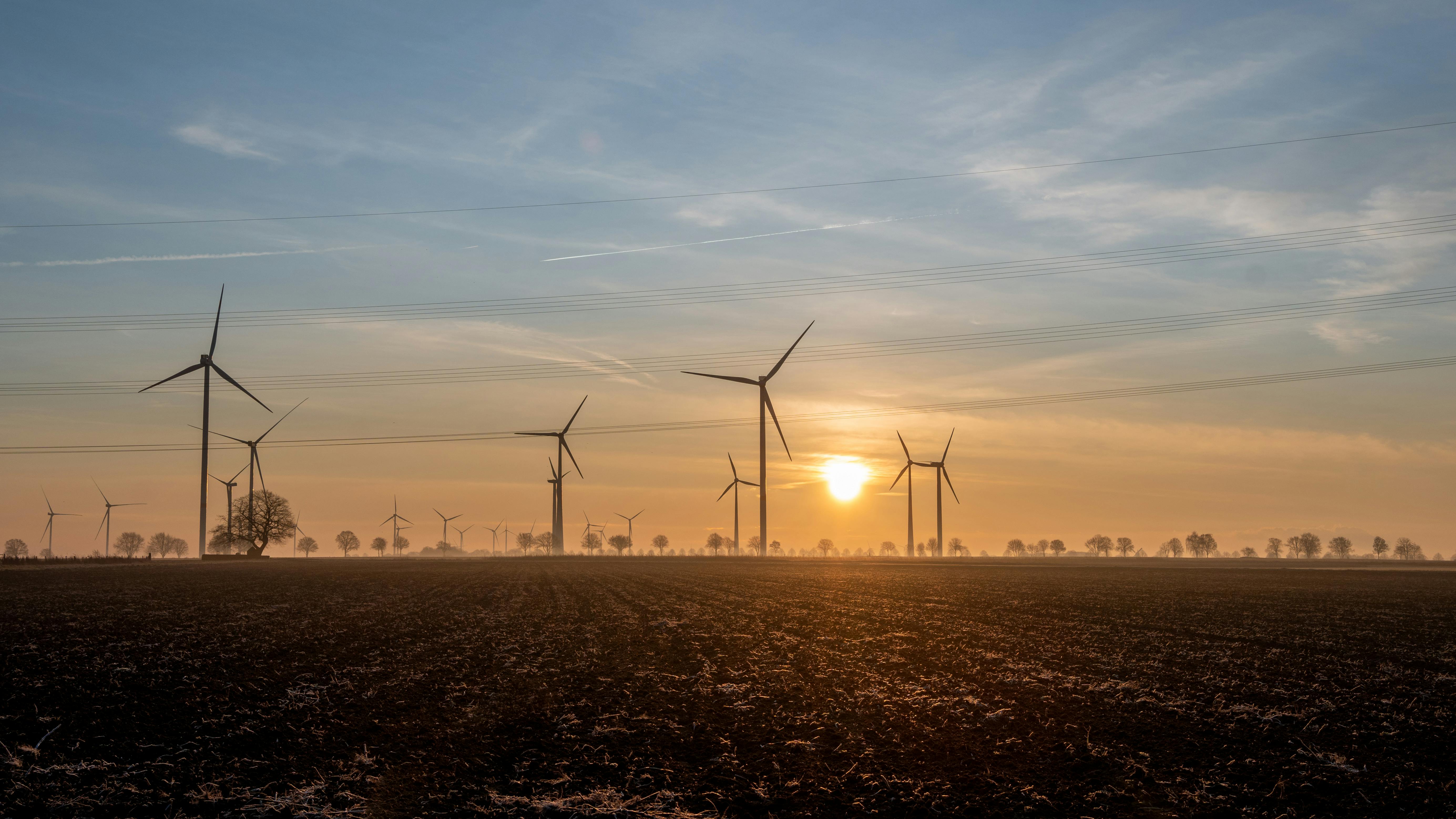Wind turbines generating power in wind farm